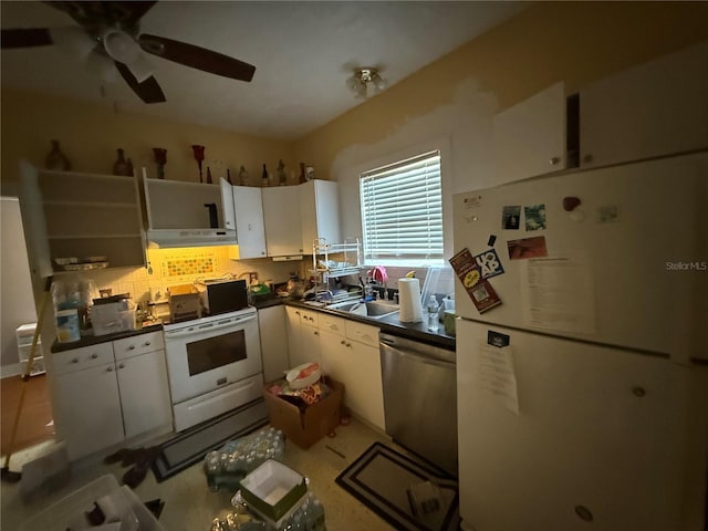 kitchen featuring tasteful backsplash, white cabinetry, sink, ceiling fan, and white appliances