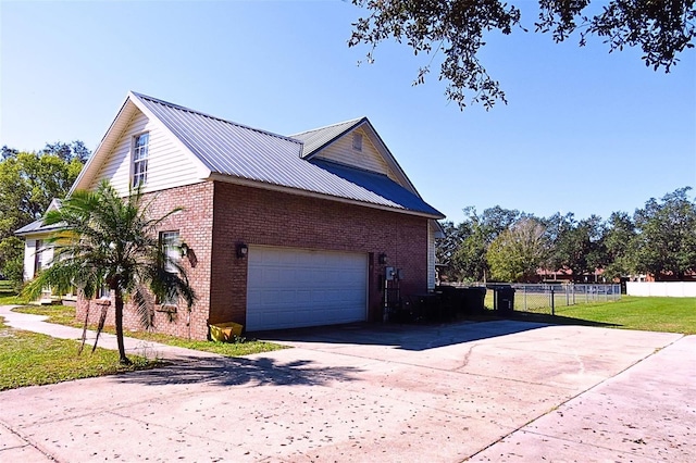 view of side of property featuring a garage