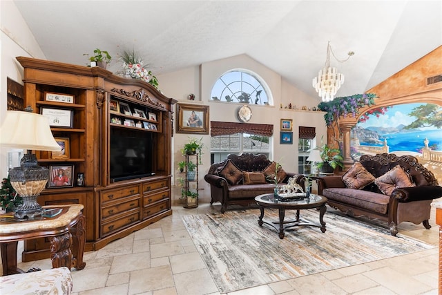 living room with high vaulted ceiling and a notable chandelier