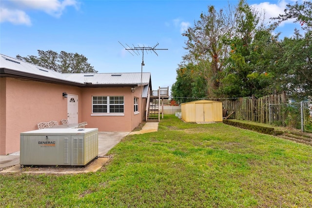 view of yard with a storage shed