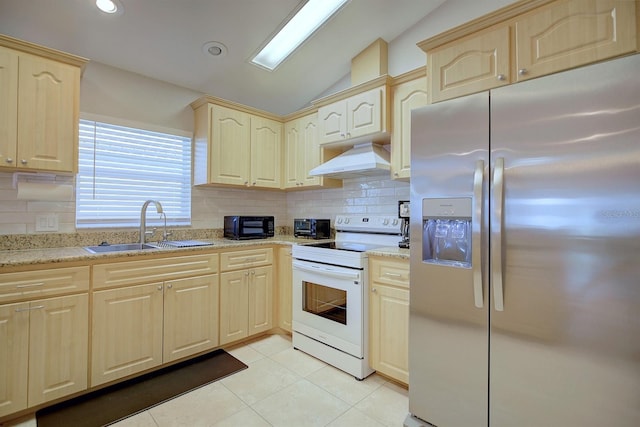 kitchen featuring lofted ceiling, sink, white electric range oven, stainless steel refrigerator with ice dispenser, and extractor fan