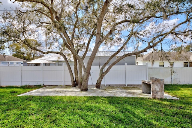 view of yard with a patio area