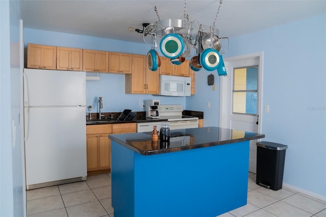 kitchen with sink, a center island, light brown cabinets, light tile patterned floors, and white appliances