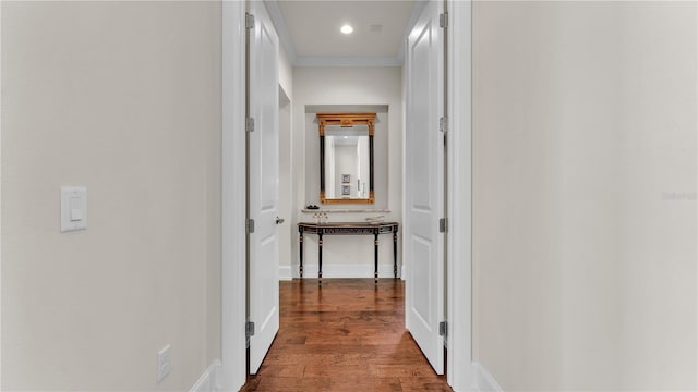 hall with crown molding and dark hardwood / wood-style floors