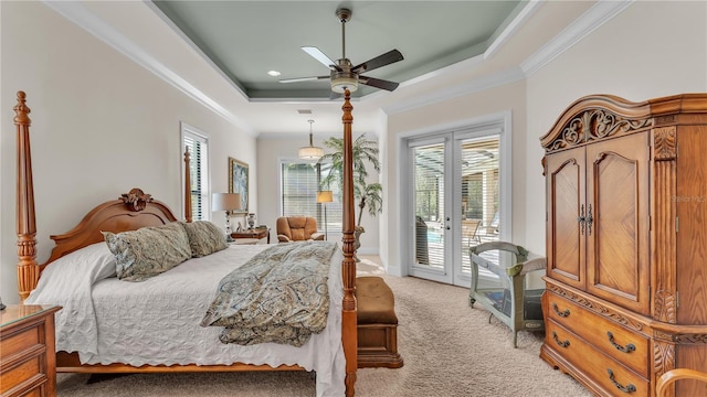 bedroom with light colored carpet, access to exterior, ceiling fan, a raised ceiling, and crown molding