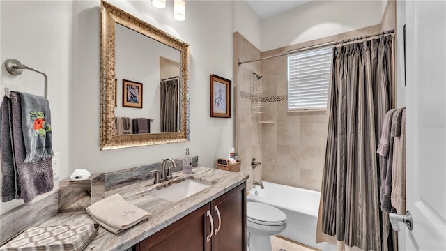 full bathroom with vanity, toilet, and shower / bath combo with shower curtain