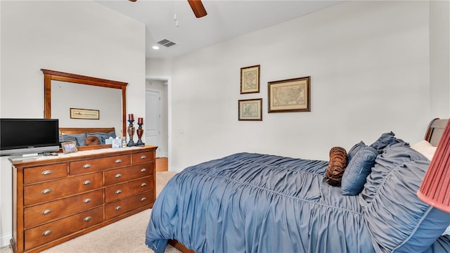 carpeted bedroom with ceiling fan