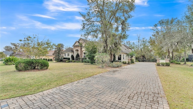 view of front of property with a front lawn