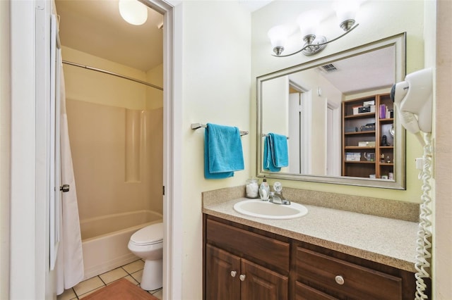 full bathroom with vanity, shower / bathtub combination with curtain, tile patterned floors, and toilet