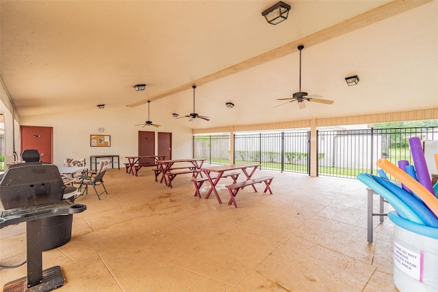 view of patio featuring area for grilling and ceiling fan