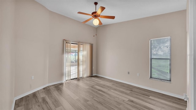 unfurnished room featuring light hardwood / wood-style flooring and ceiling fan