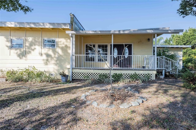 view of front of house with covered porch