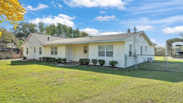 ranch-style home featuring a front yard, a gate, fence, and stucco siding