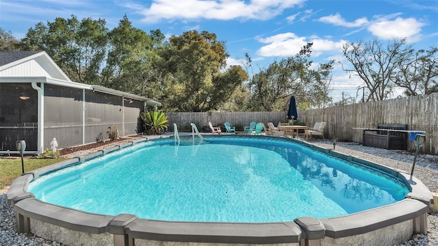 view of swimming pool featuring a fenced in pool and a fenced backyard