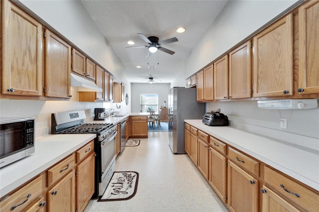 kitchen featuring stainless steel appliances and ceiling fan