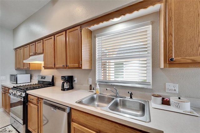 kitchen with appliances with stainless steel finishes and sink