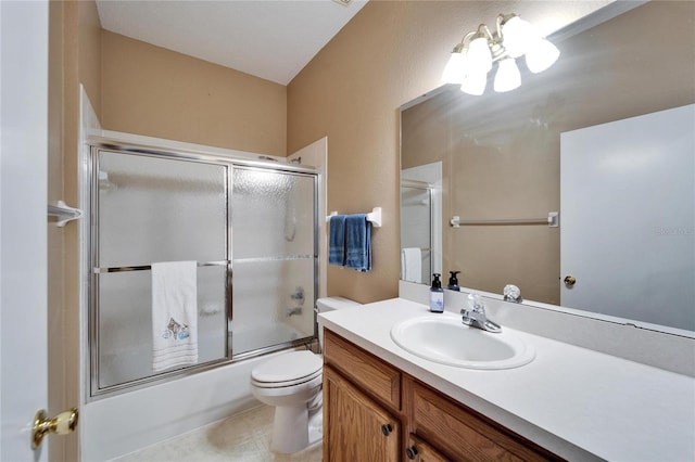 full bathroom with vanity, shower / bath combination with glass door, and toilet