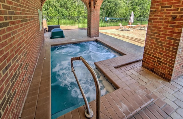 view of pool with a patio