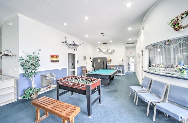 playroom featuring ornamental molding, a textured ceiling, dark carpet, and billiards