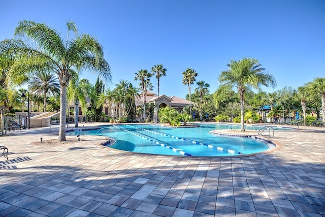 view of swimming pool featuring a patio