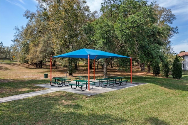 surrounding community featuring a patio and a yard