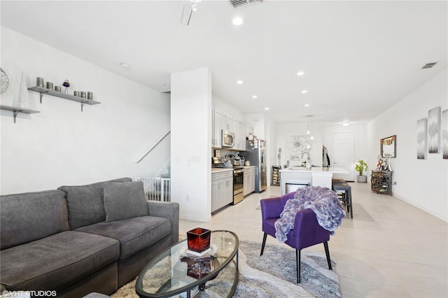 living room with sink