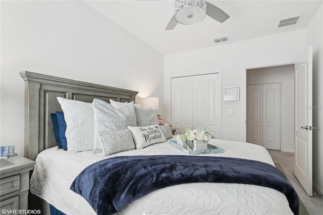 carpeted bedroom featuring ceiling fan and a closet