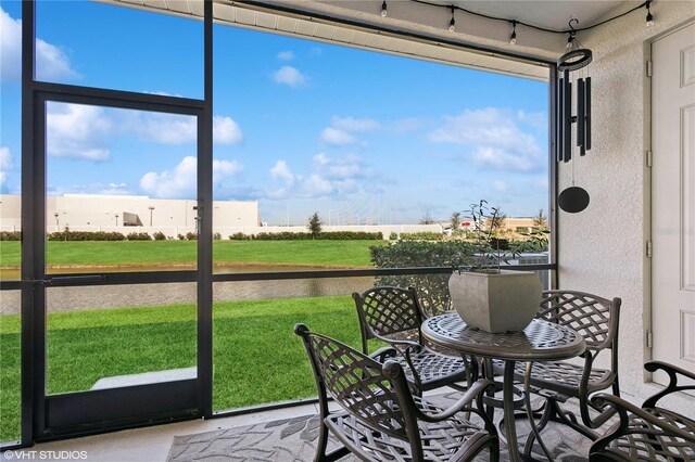 11658 Bluestone Ct, Parrish, FL 34219 - sunroom / solarium featuring healthy amount of natural light