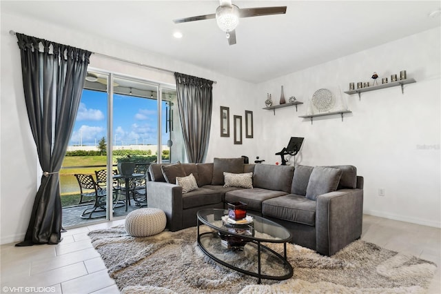 11658 Bluestone Ct, Parrish, FL 34219 - living room featuring a ceiling fan, baseboards, light tile patterned flooring, and recessed lighting