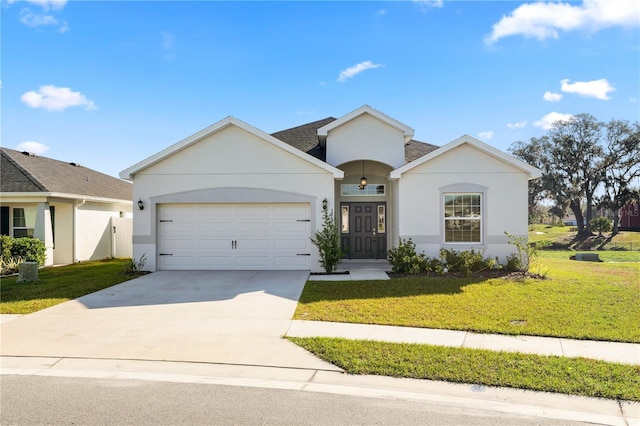 ranch-style house featuring a garage and a front lawn