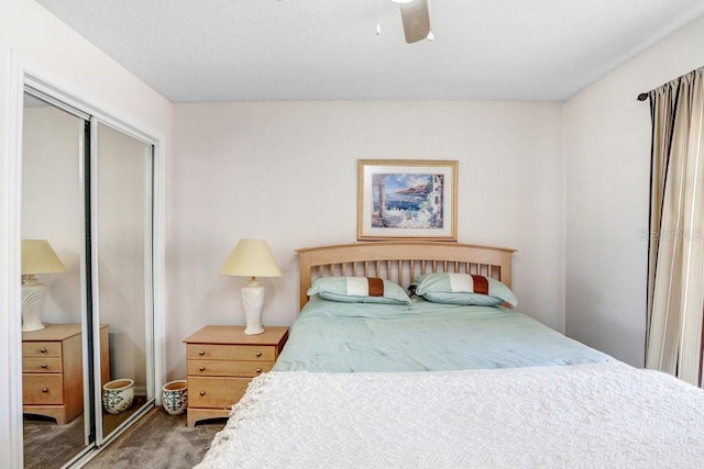 bedroom with carpet flooring, ceiling fan, and a closet