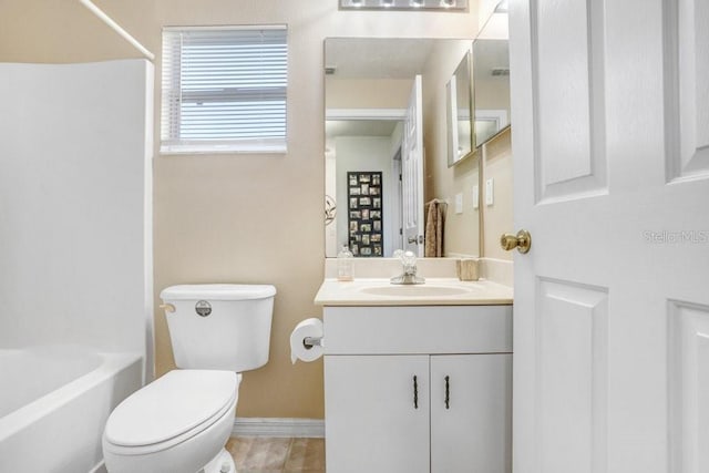 full bathroom with vanity,  shower combination, and toilet