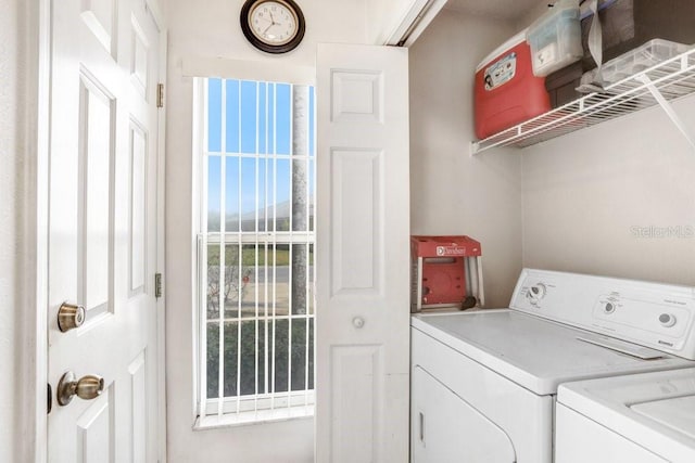 laundry room with separate washer and dryer