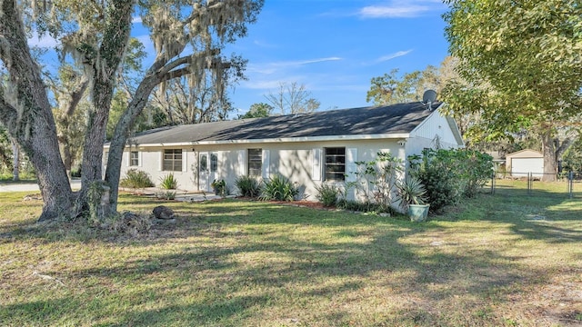 ranch-style house with a front yard