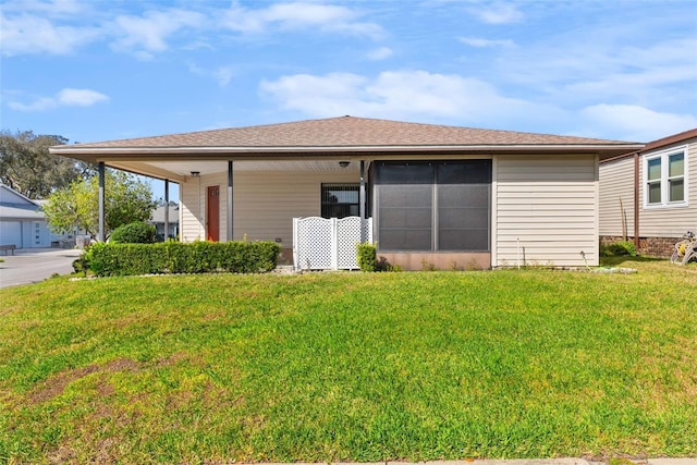 exterior space with a lawn