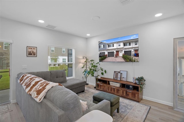 living room featuring light wood-type flooring