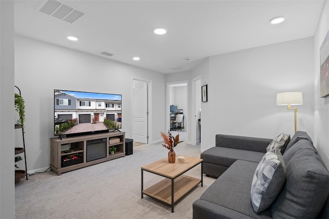 living room with light colored carpet