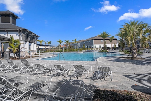 view of pool featuring a patio area