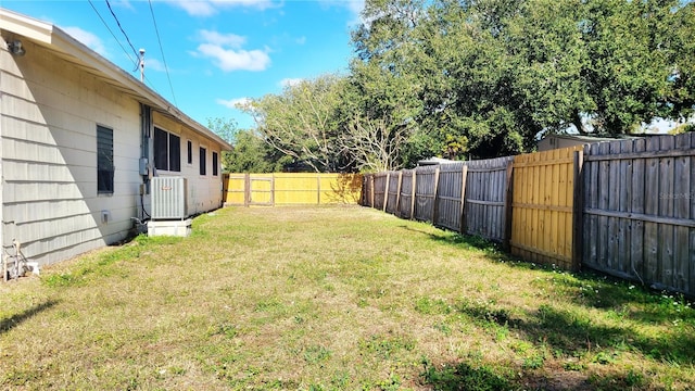 view of yard with central air condition unit