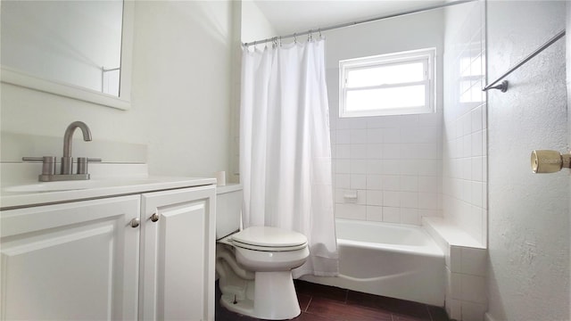 full bathroom featuring vanity, toilet, and shower / bath combo