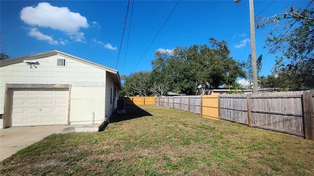 view of yard featuring a garage