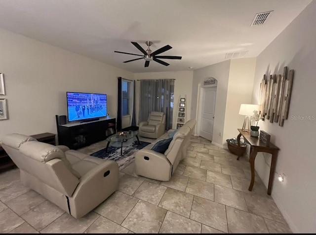 living room featuring ceiling fan