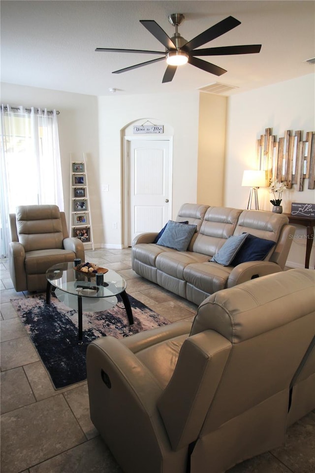 living room featuring ceiling fan