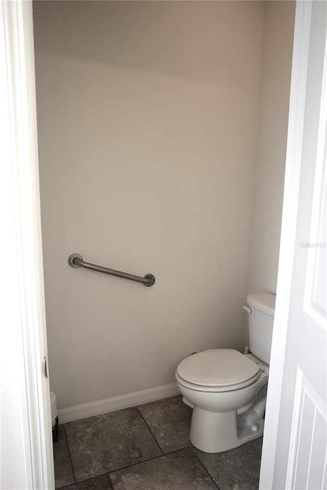 bathroom featuring toilet