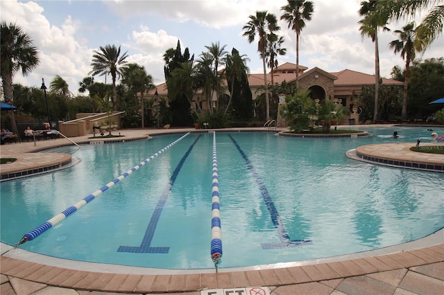 view of pool featuring a patio area