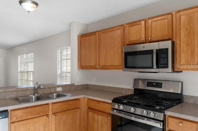 kitchen featuring stainless steel appliances and sink