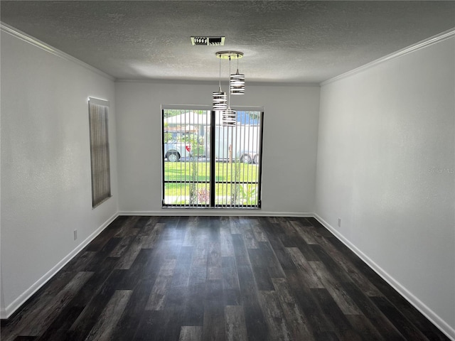 unfurnished dining area with ornamental molding, dark hardwood / wood-style floors, and a textured ceiling