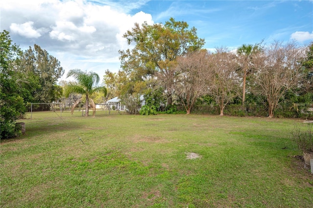 view of yard featuring fence