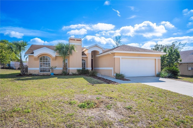 view of front facade featuring a garage and a front yard