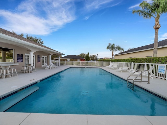 view of pool featuring a patio area